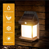 Solar-powered outdoor light with waterproof, windproof, frost-resistant, and heat-resistant features on an orange background.